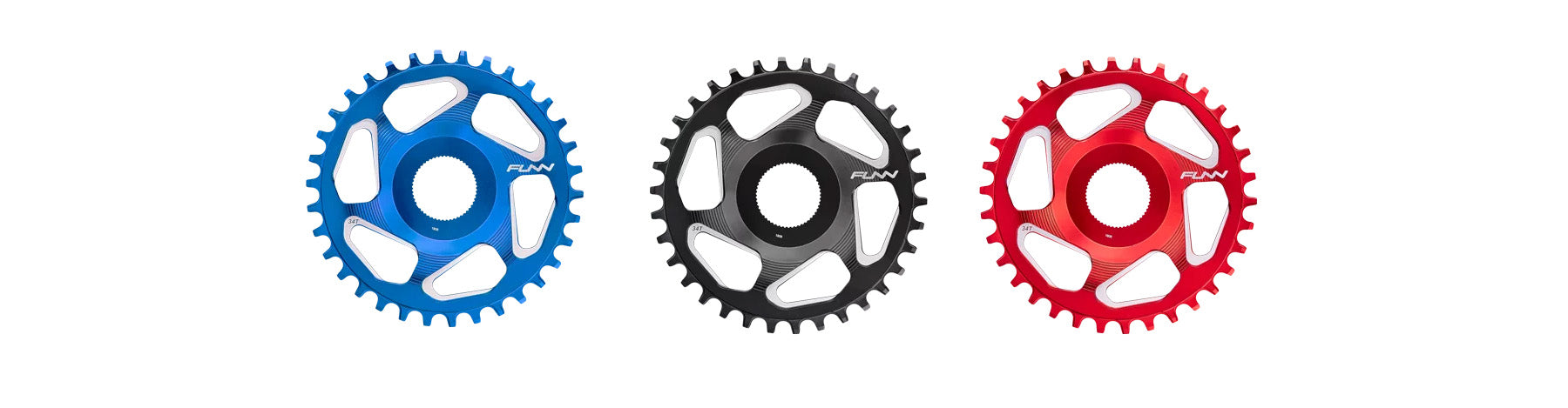Three bicycle chainrings are displayed side by side on a white background. The chainrings are blue, black, and red, each featuring a similar design with the brand name FUNN printed on them.