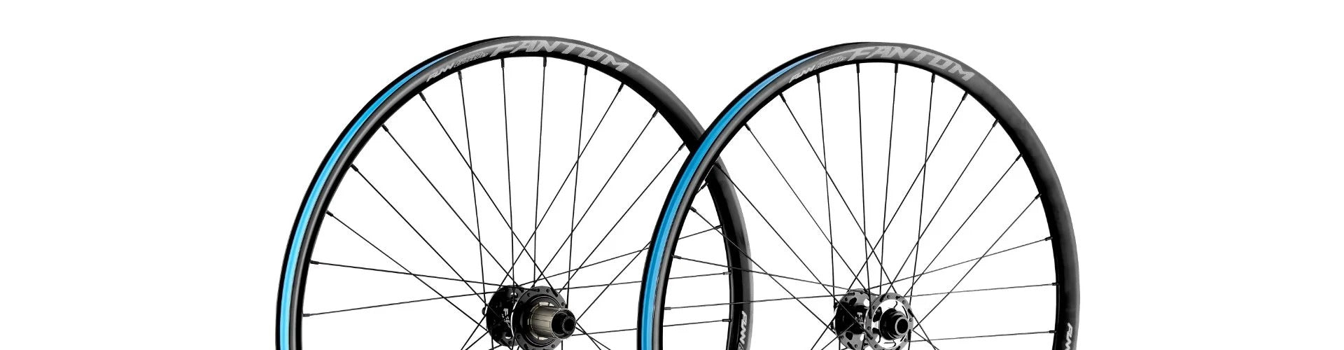 Two black bicycle wheels with thin blue stripes and the word FANTOM in white on the rims, shown upright against a white background. The wheels have multiple spokes and disc brake hubs.