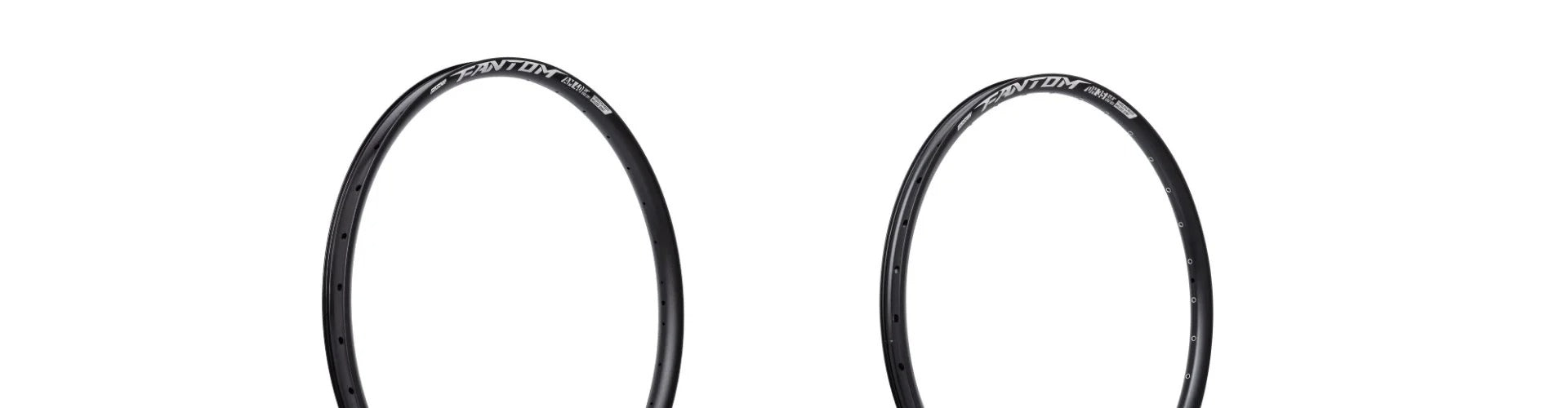 Two black bicycle rims, each with white branding text, displayed upright against a plain white background.