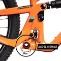 Close-up of the Funn Zippa LG Chain Guide on an orange bike frame, focusing on the CNC-machined alloy ISCG-05 interface with a black circle and text showing the 56mm bolt hole spacing.