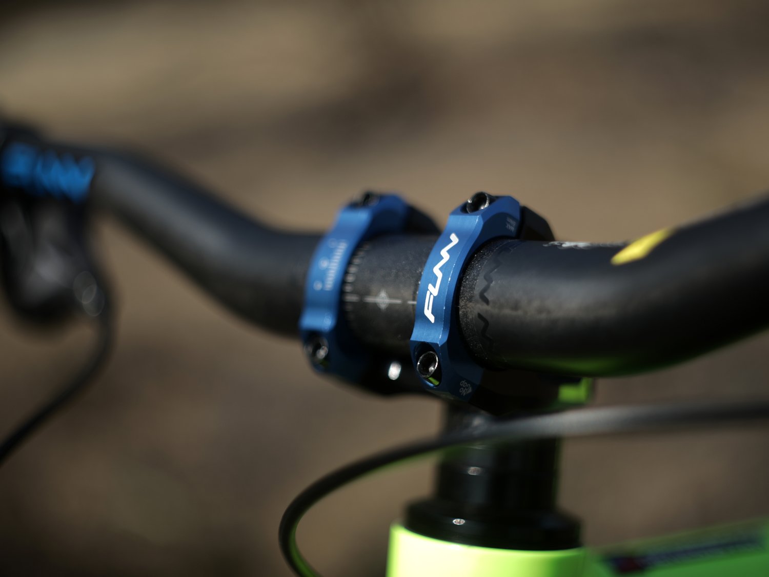 a mountain bike equipped with blue equalizer zero stem