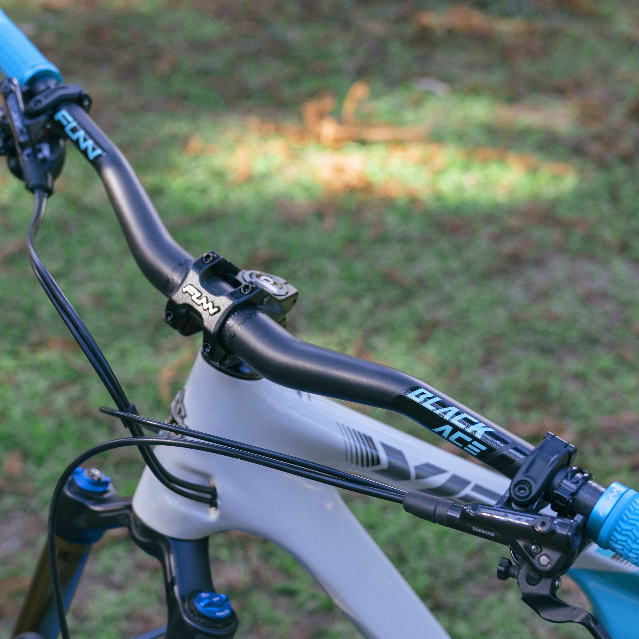 FUNN Black Ace Carbon Handlebar on mountain bike, matte black rise bar with 6 colorways stickers for custom style