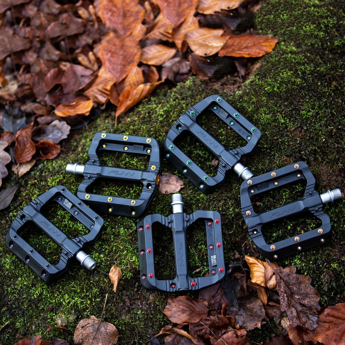 Funn mountain bike components - Black Magic Flat Pedals Black in a white background.