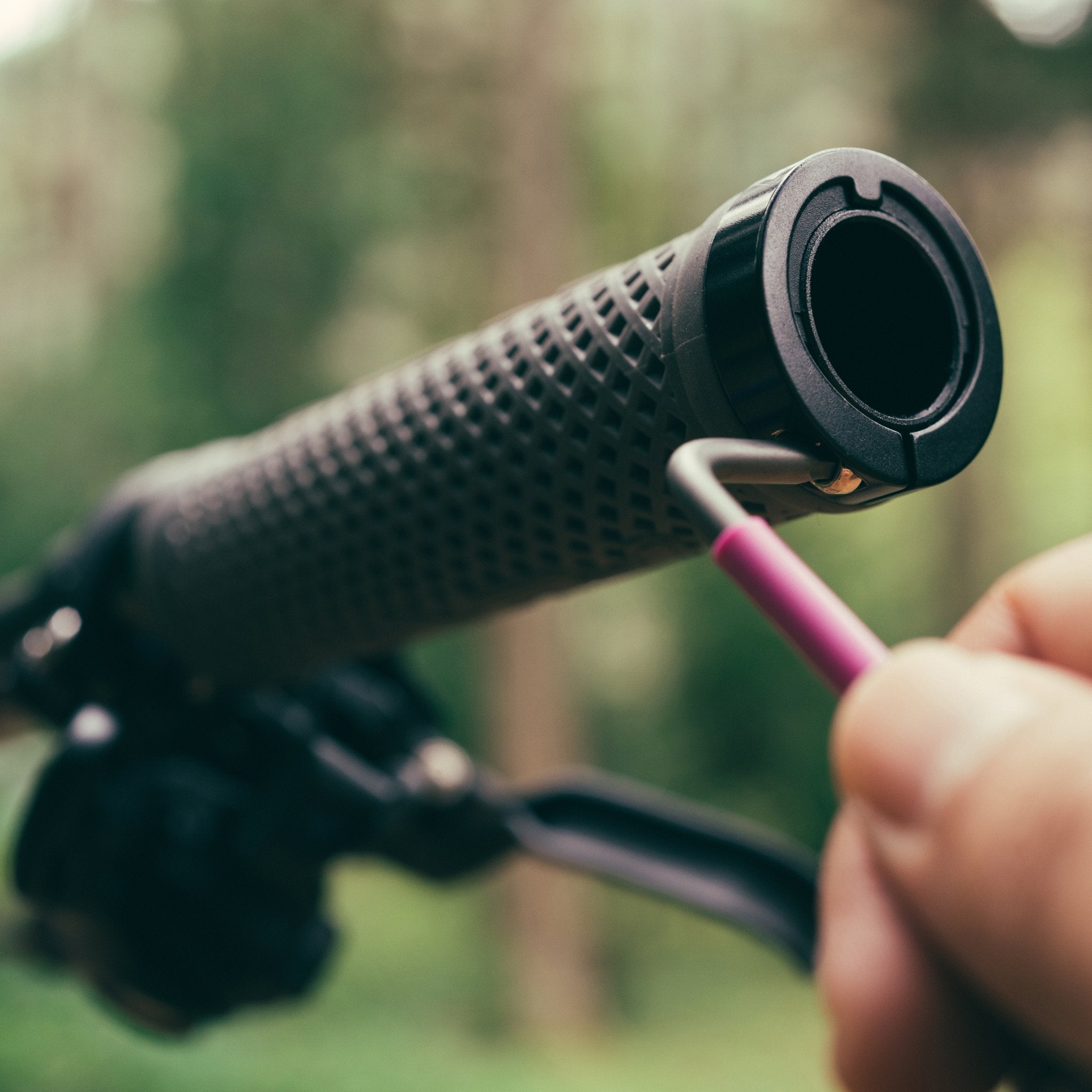 FUNN Combat II Lock-On Grips with textured rubber, dual lock rings and hex key tightening on a mountain bike handlebar