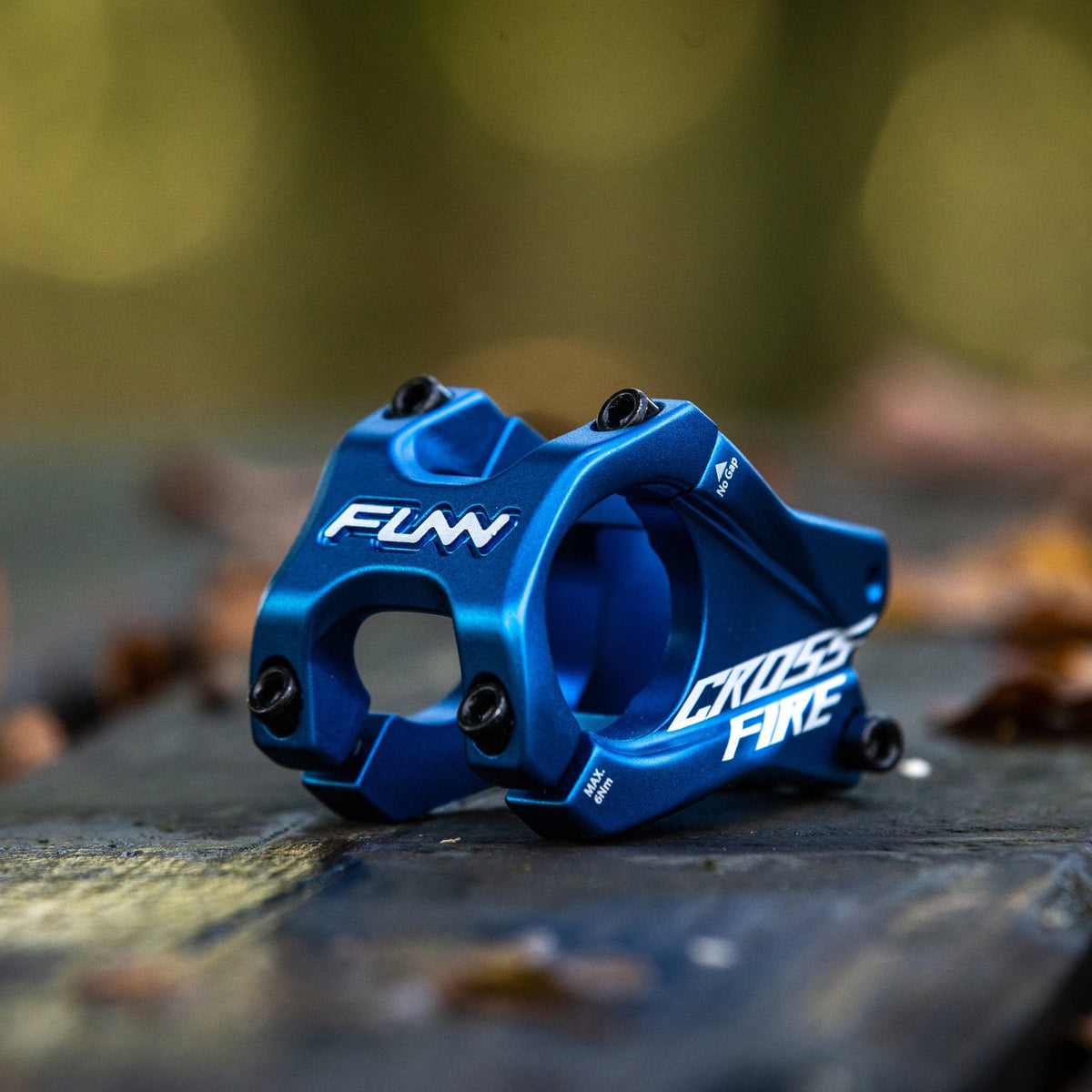 FUNN Crossfire Stem, blue alloy MTB handlebar stem, 31.8mm clamp 35mm length with four-bolt faceplate on outdoor surface