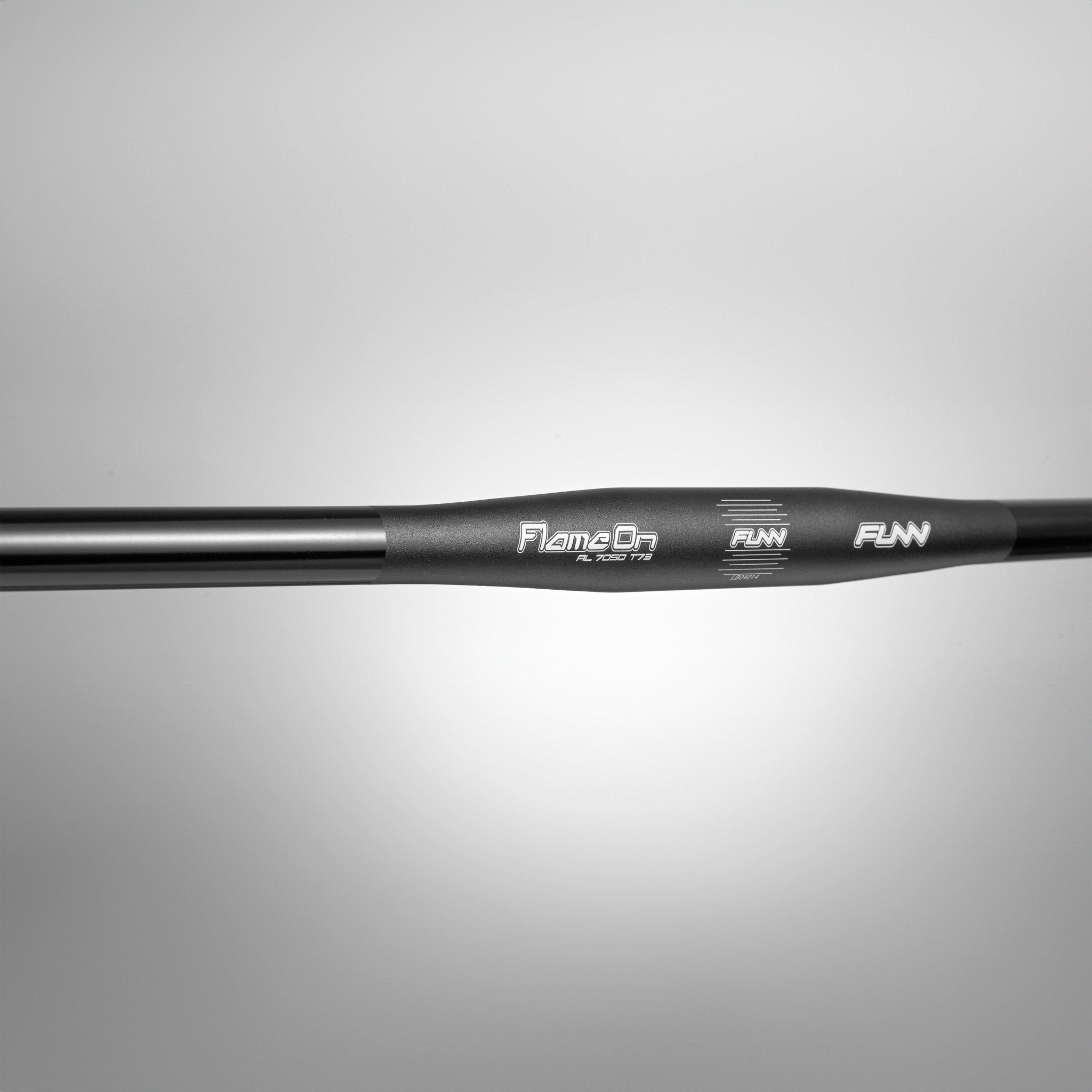 Black FUNN Flame On flat handlebar, lightweight alloy MTB bar with subtle logos and smooth straight profile on grey background