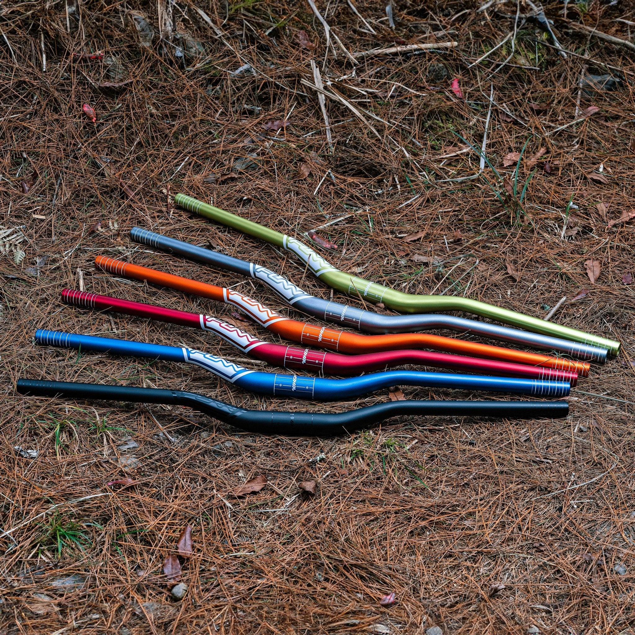 FUNN Kingpin Riser Handlebar set in colorful anodized alloy, wide curved MTB bars for strong, responsive bike control