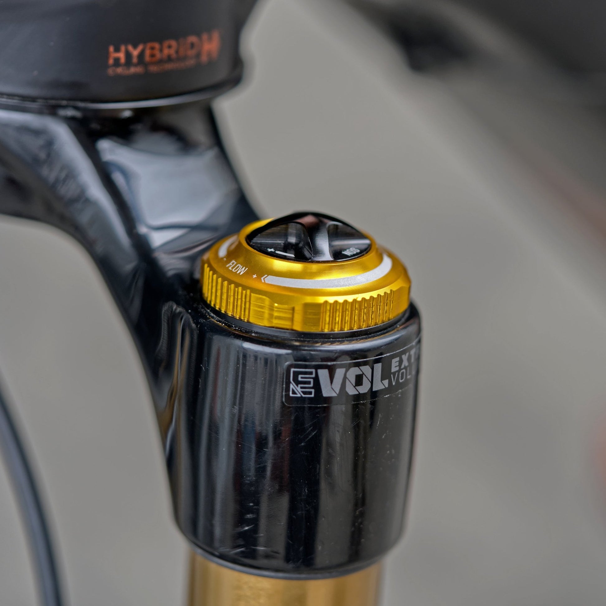 Funn mountain bike components - NOS Air Fork Valve Cap F-Type Gold in a white background.