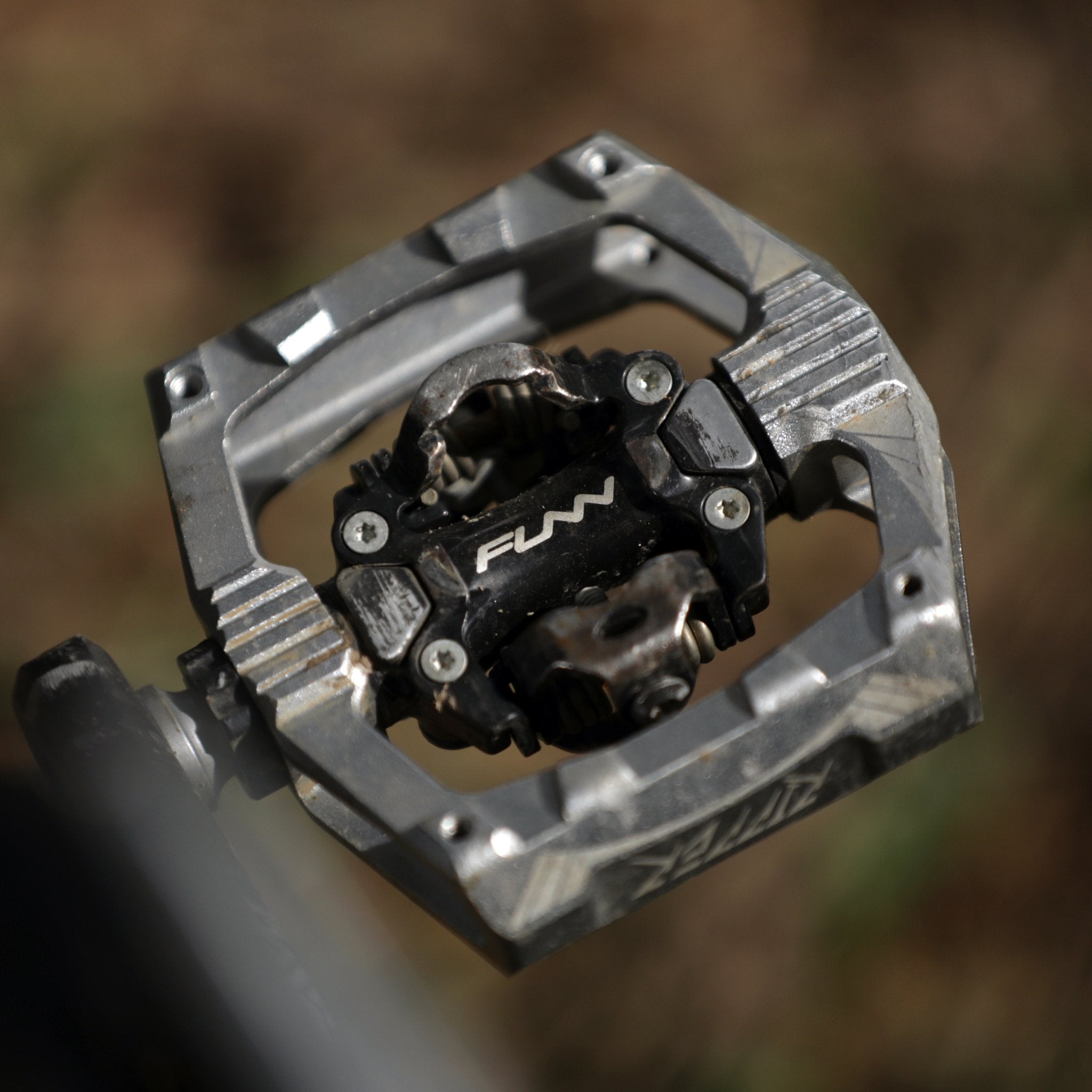FUNN Ripper clip-in SPD pedals, grey alloy platform with black mechanism, rugged MTB design for secure shoe engagement