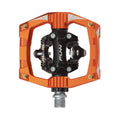 Funn mountain bike components - Ripper Clipless Pedals Orange in a white background.