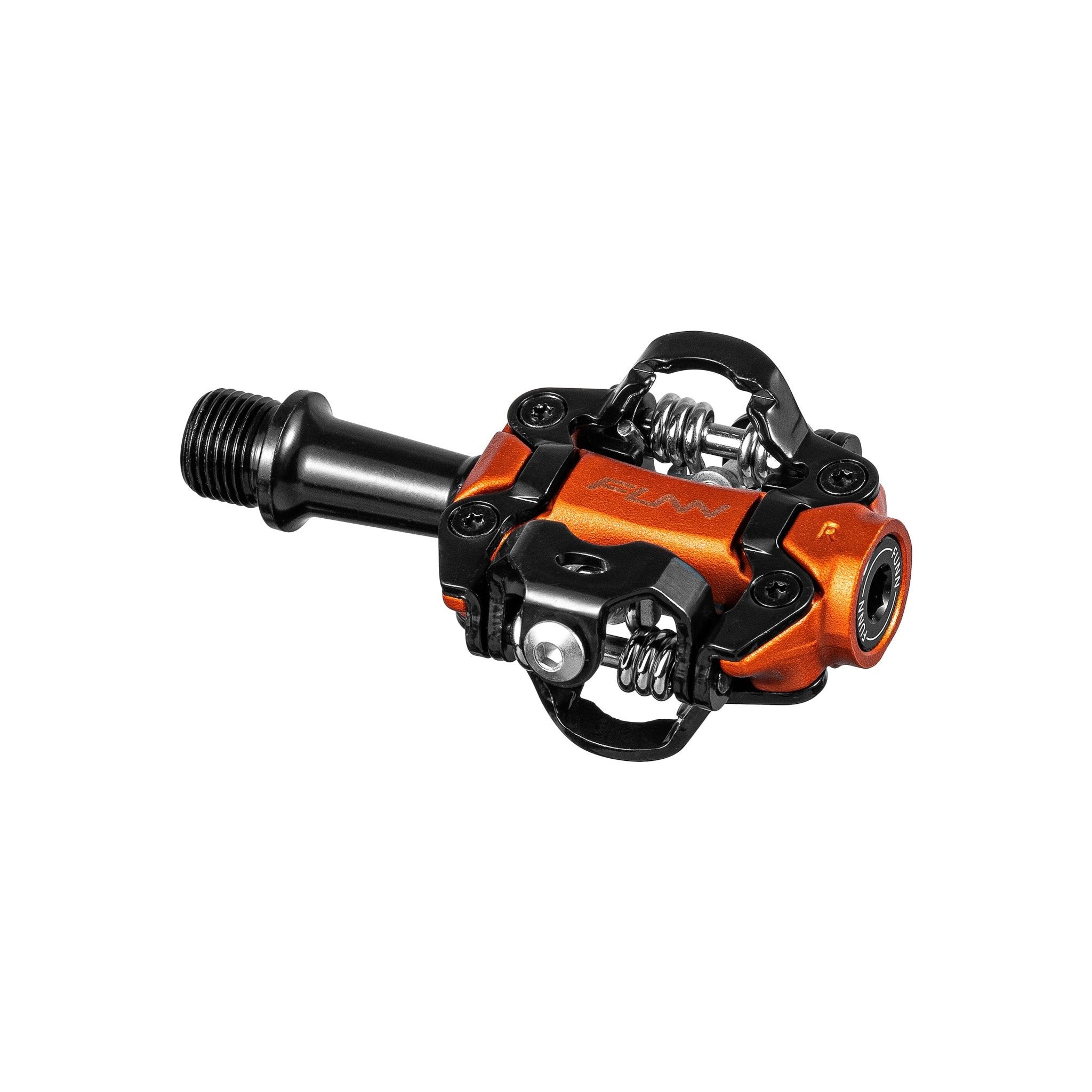 FUNN Tactic Clip-In Pedals in orange alloy with black steel spindle and spring mechanism for secure mountain bike shoe engagement