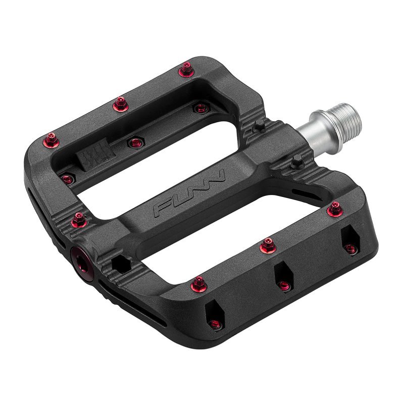 a Black Magic bicycle pedals with red pins