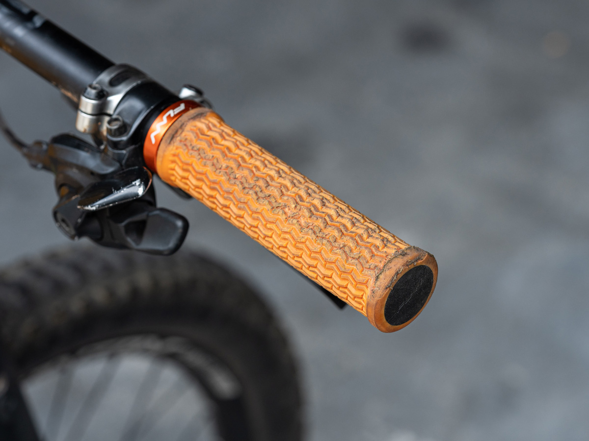 A close up of the damaged bike grip.