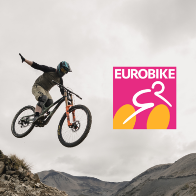 FunnMTB rider airborne next to the Eurobike 2023 icon showcasing extreme biking thrill
